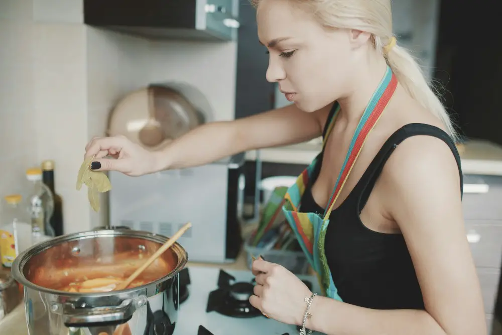 a woman is cooking