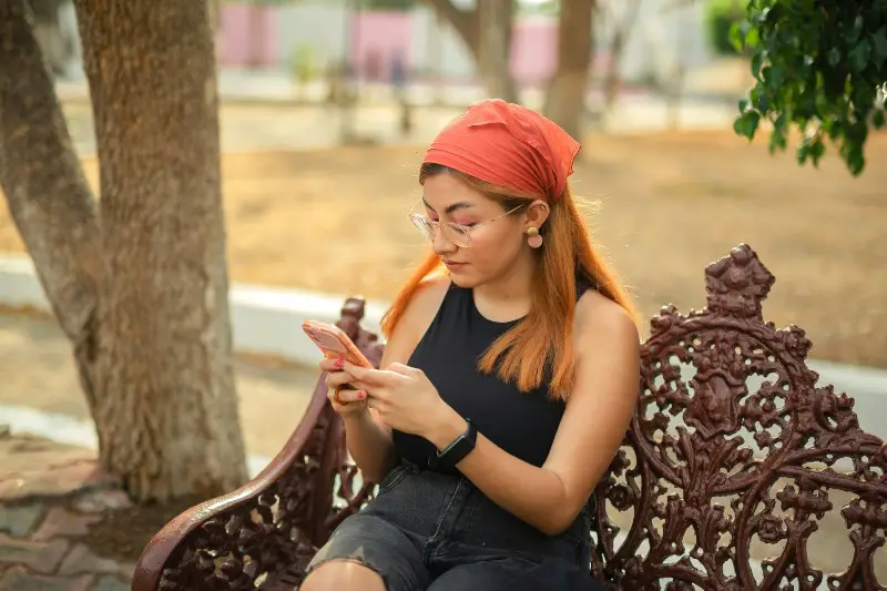 a woman sitting text wtv